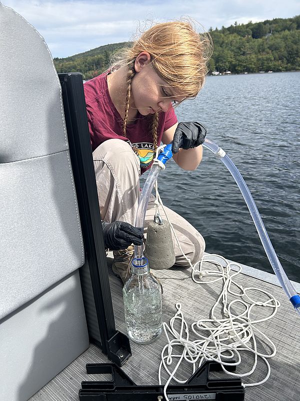 NLRA staff member samples for invasive spiny water flea in Newfound Lake.