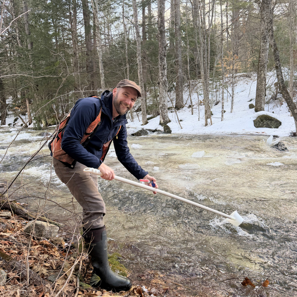 Conservation Program Manager, Paul Pellissier takes samples from the Cockermouth River.