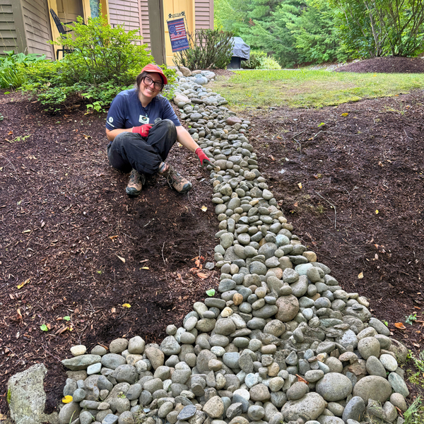 AmeriCorps Steward completes a stormwater apron at a local homeowners association.