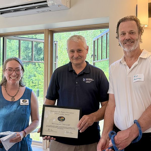 Rebecca Hanson left, Bob Craycraft center holding the Founders’ Award Certificate, and Rich Radimer right
