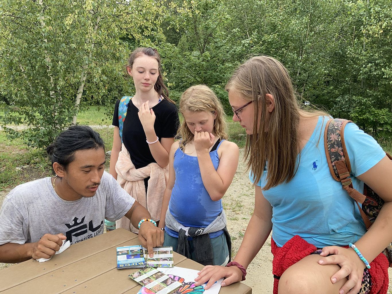 Student learning about the lake outside