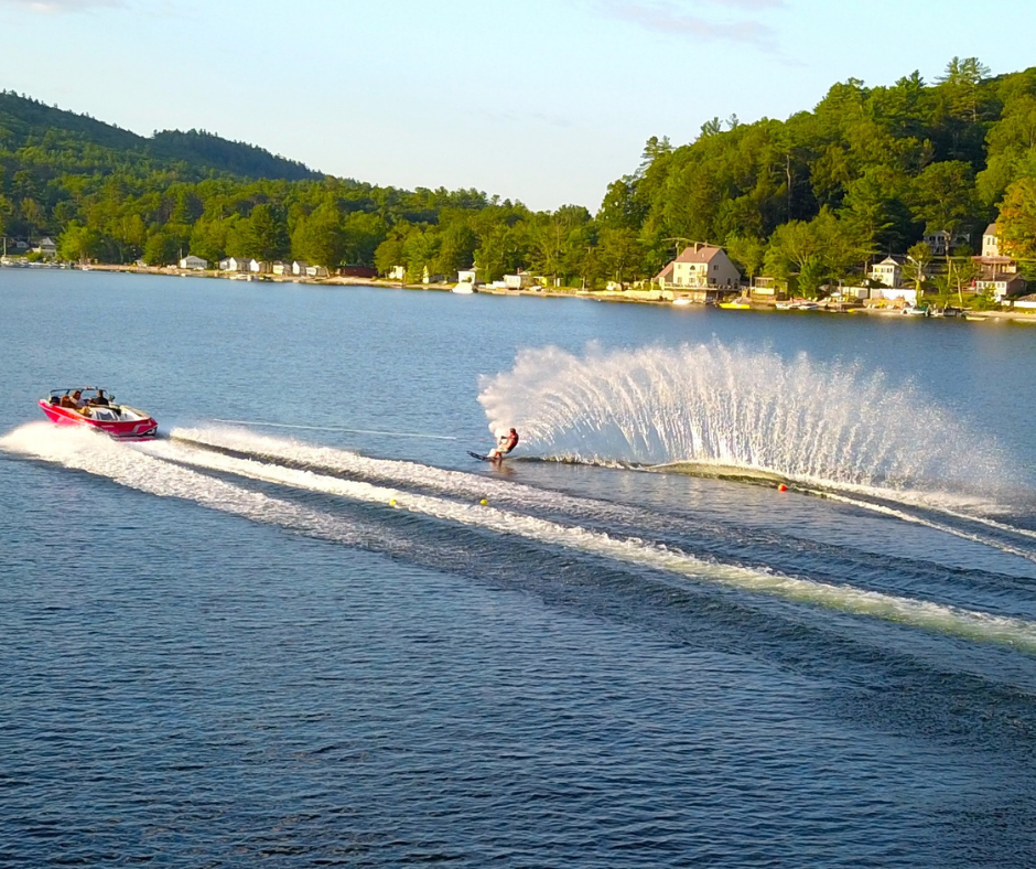 A water skier being towed across Newfound Lake
